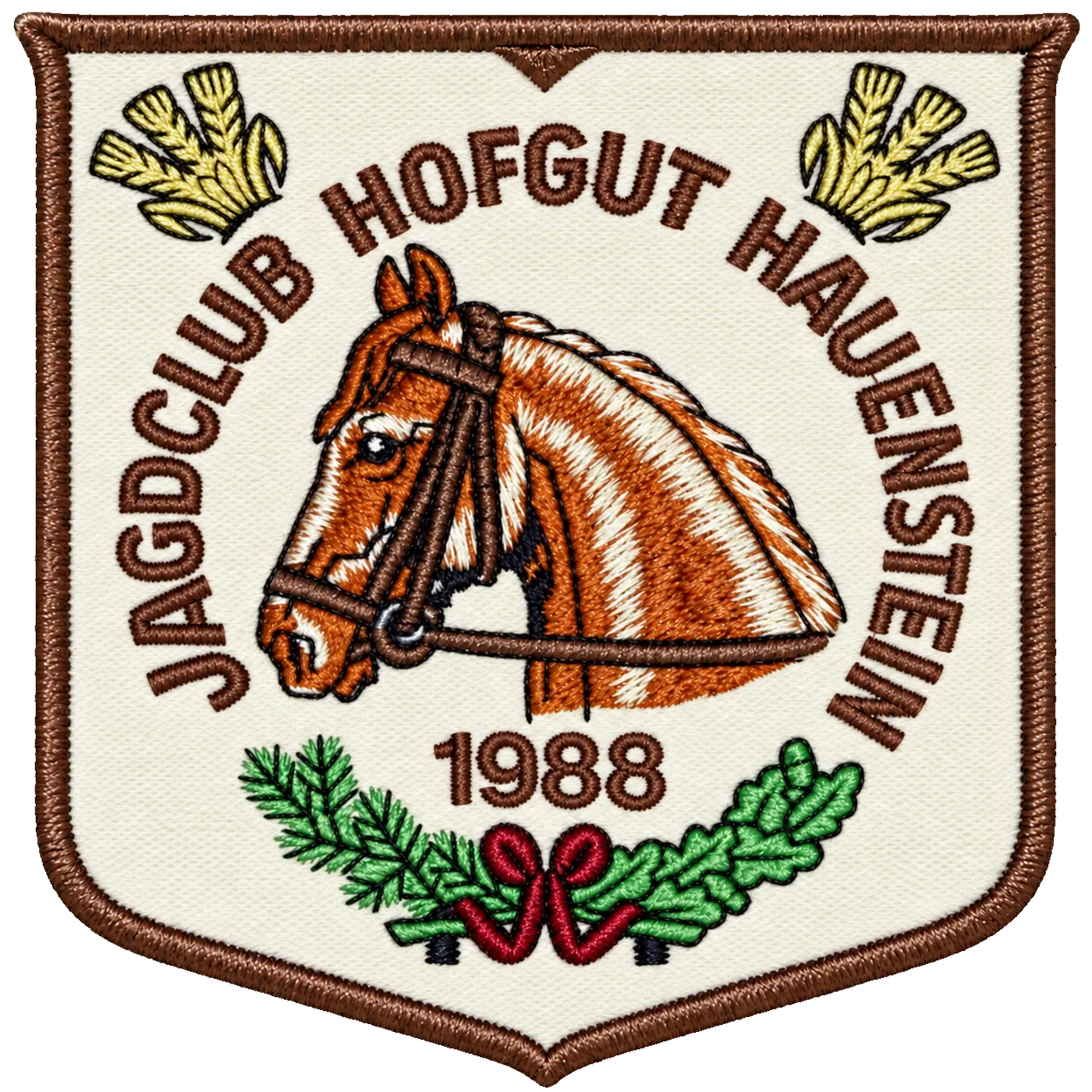 The redesigned crest of Jagdclub Hofgut Hauenstein: a horse’s head on a cream ground, framed in brown